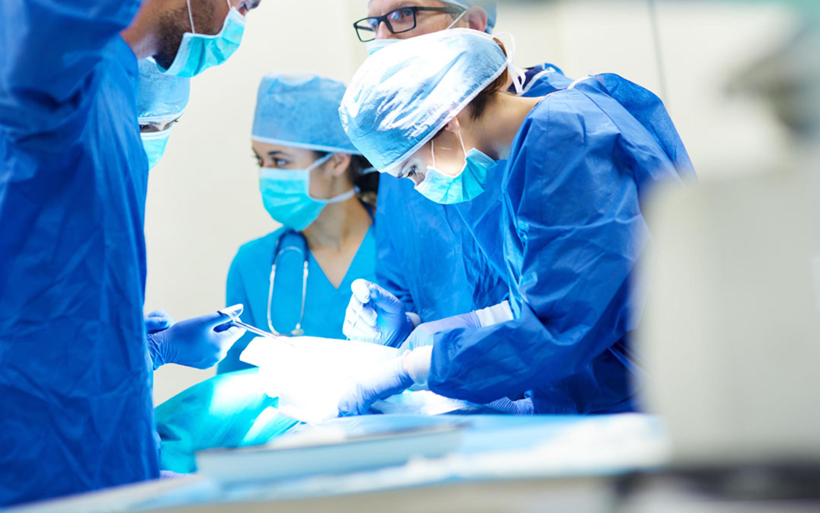 Close up of surgery team operating