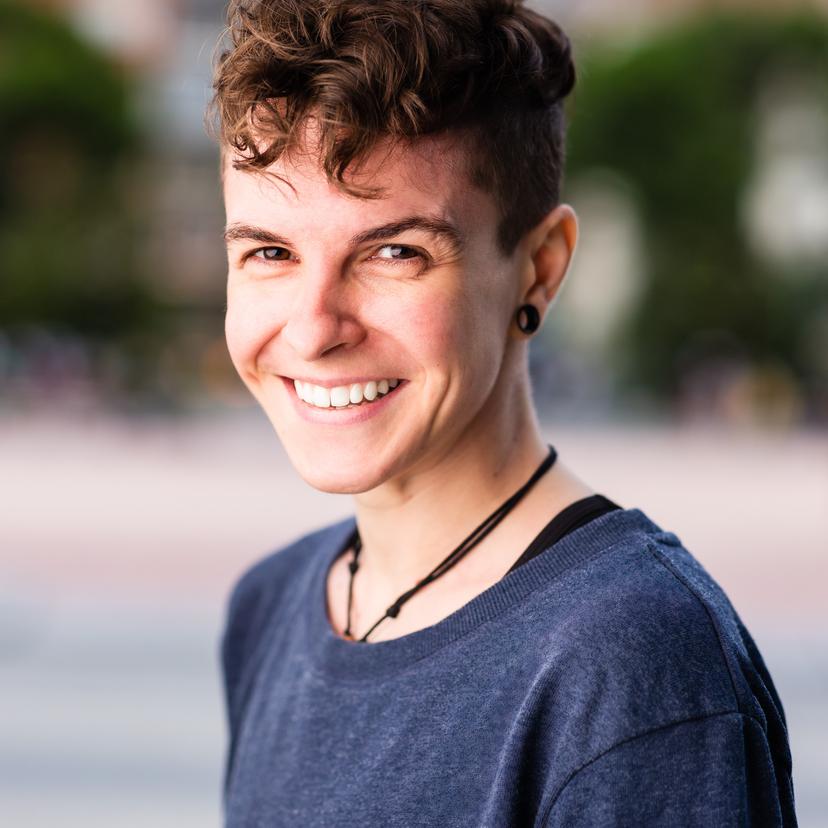 LGBTQ+ person smiling