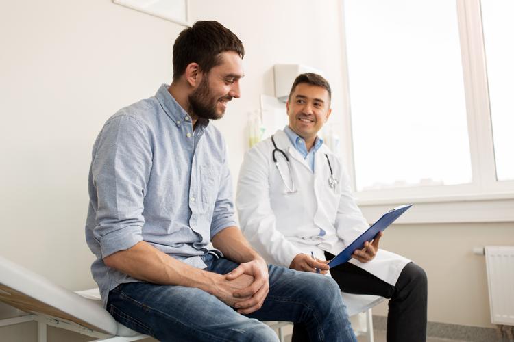 Man speaking with his doctor
