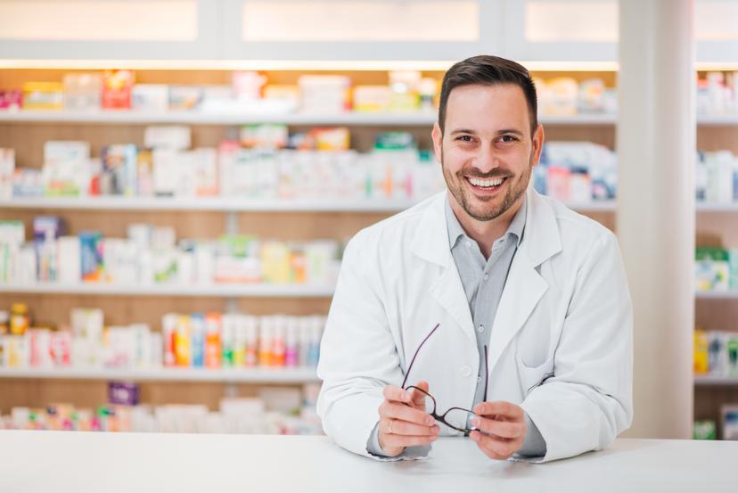 male pharmacist at counter