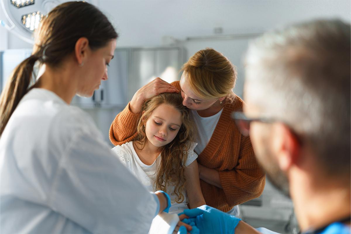 injured girl being treated at an urgent care clinic