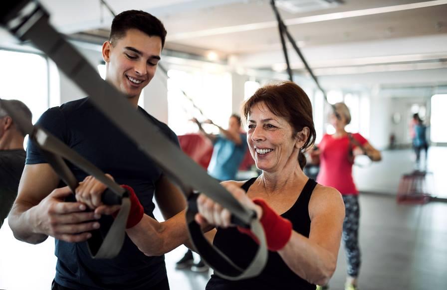 Adult working out with a personal trainer.