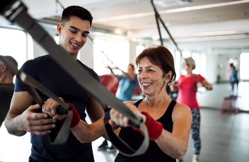 Adult working out with a personal trainer.