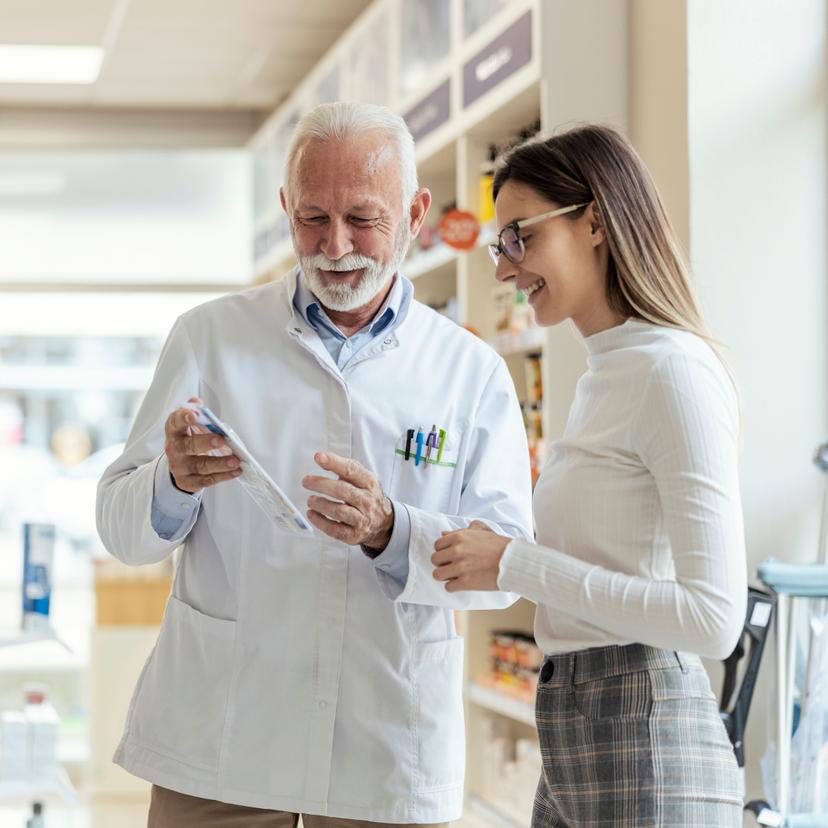 pharmacist with patient