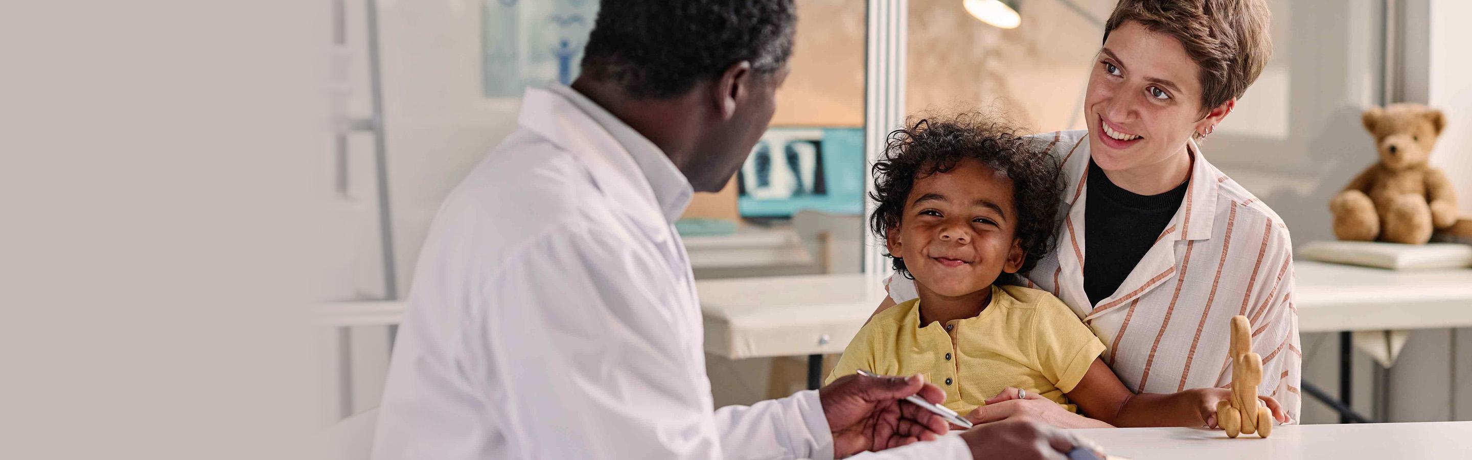 Mother and daughter talking to a doctor