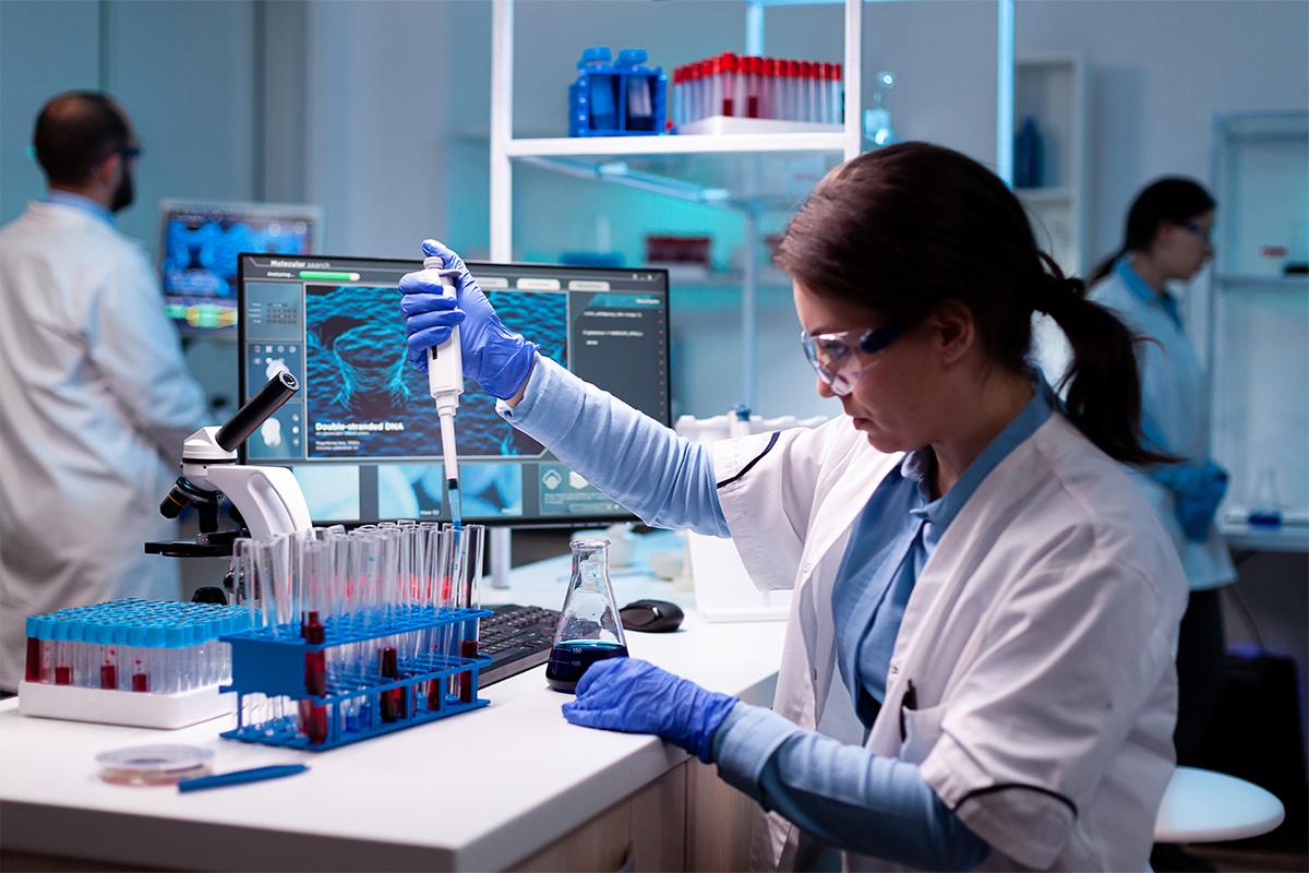 Medical professional taking blood samples in a research lab