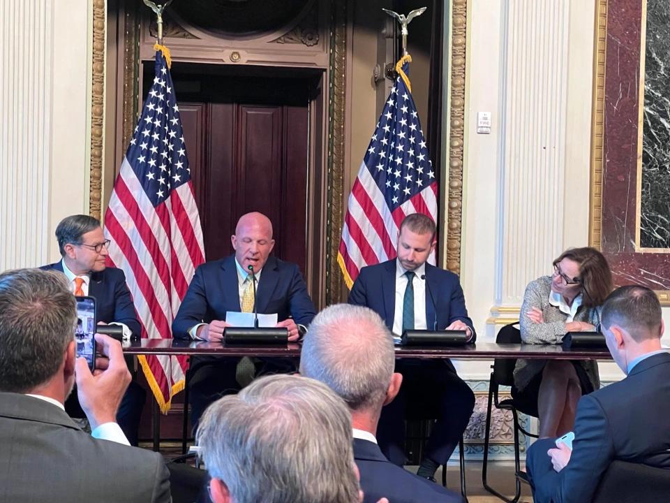 four people sat at a table