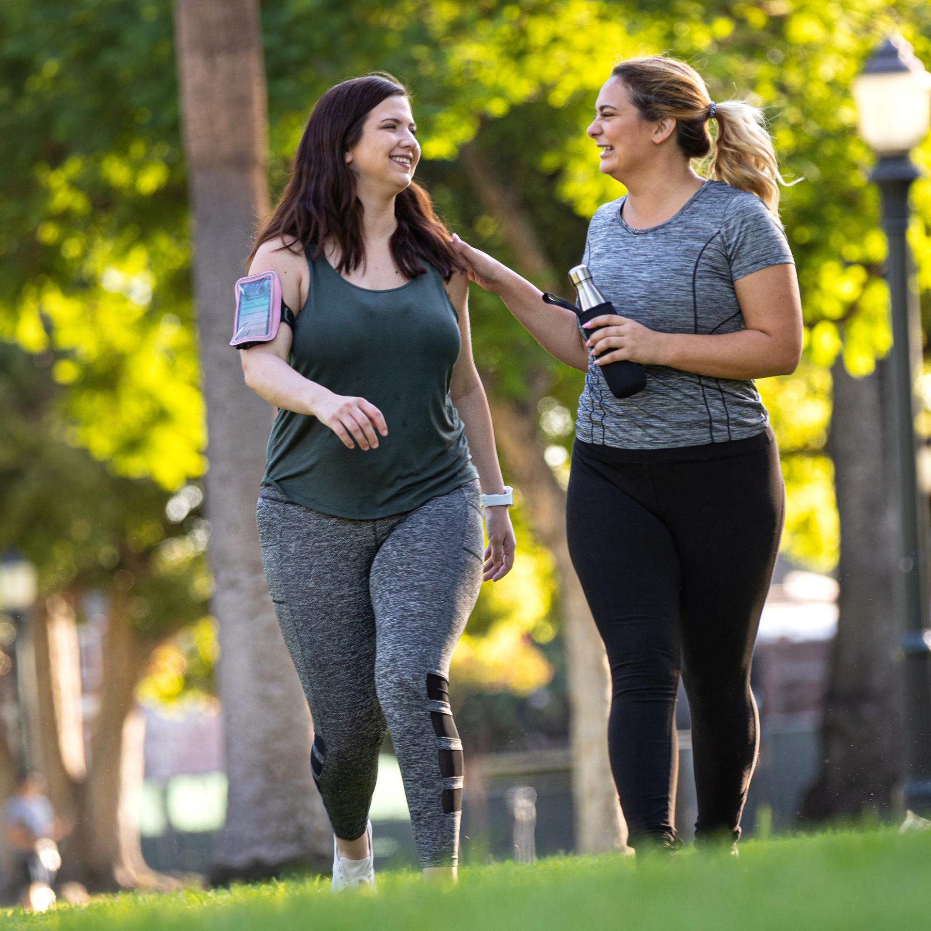 Two women walking outdoors