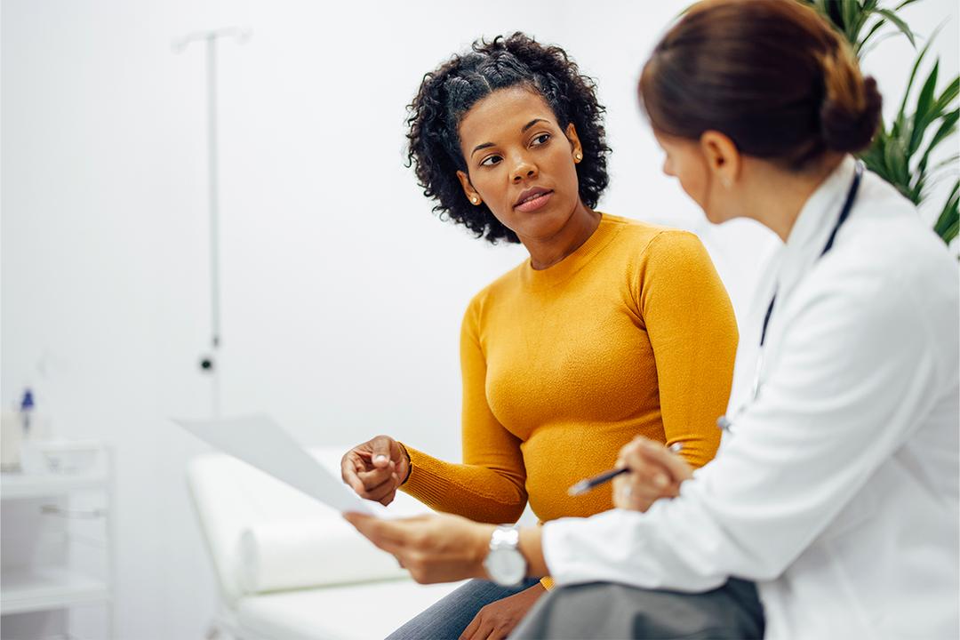 woman discussing medical treatment