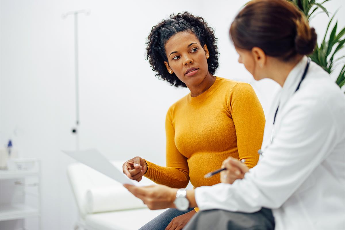 woman discussing medical treatment