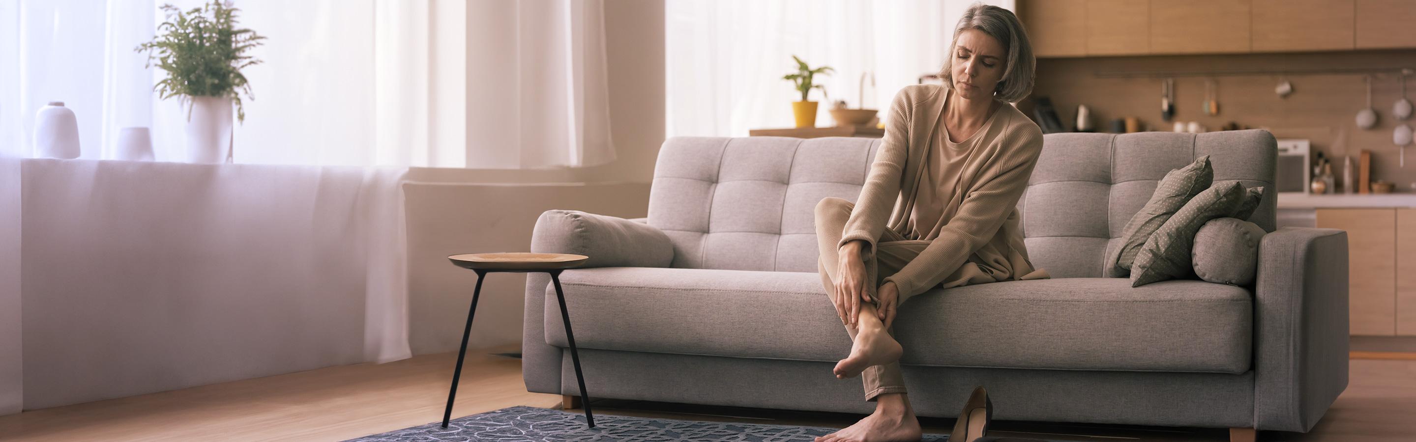 Woman with a sore ankle