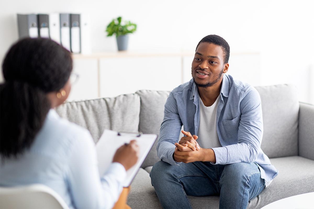 Young man speaking with a therapist