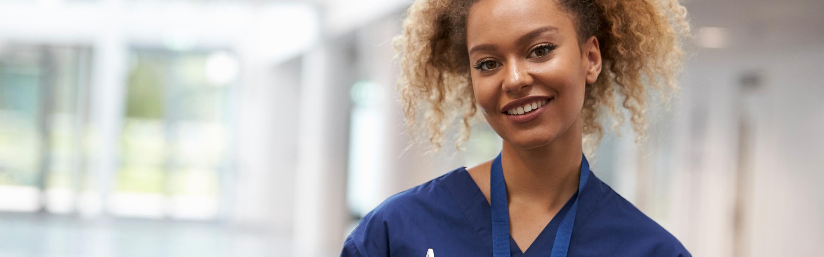 Woman with curly hair smiling
