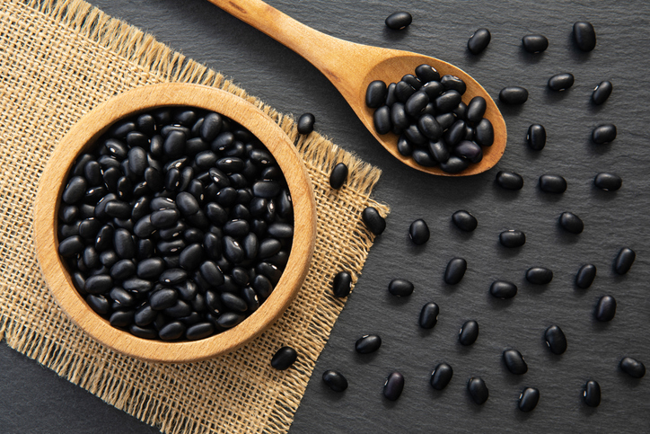 Dried raw black bean in a bowl