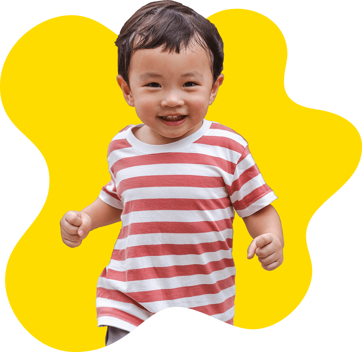 boy running in striped shirt on yellow background