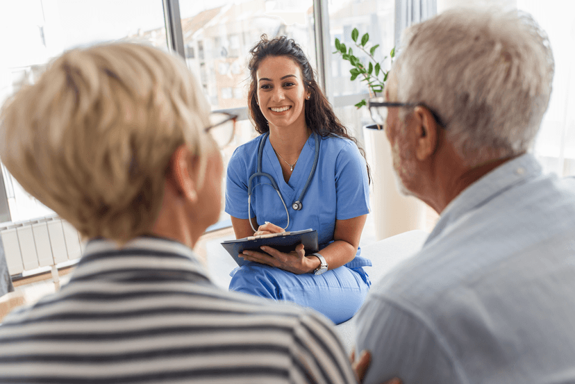 provider interviewing patient and spouse